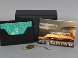 a black wallet with a card holder and a picture of a car on it
