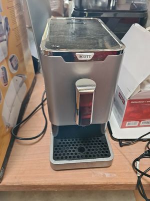a coffee machine that is sitting on a table