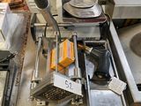 a machine that is sitting on a counter in a kitchen