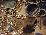 many different types of jewelry on display in a store