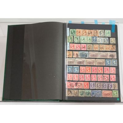 an open book with a lot of stamps on the pages