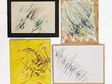 four paintings of different colors and shapes are displayed on a white surface