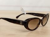 a close up of a pair of sunglasses on a table