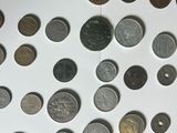 a lot of coins on the table with a note