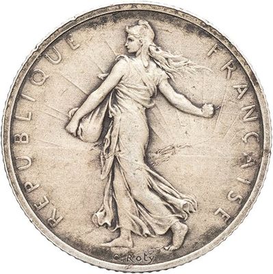 une vieille pièce d'argent avec une femme tenant un sac