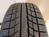 a close up of a tire on a wooden floor