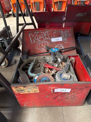 a red box with a bunch of tools inside of it