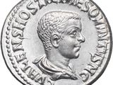 Gros plan sur une pièce de monnaie portant le visage d'un homme
