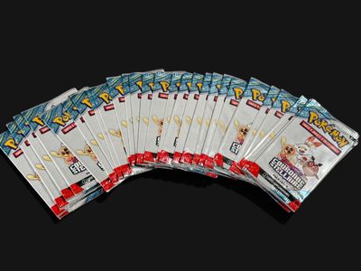 several packs of pokemon cards are stacked on top of each other