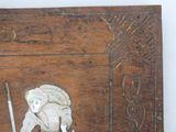 a picture of a wooden box with a picture of a woman on it