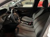 the interior of a car with a steering wheel and a dashboard