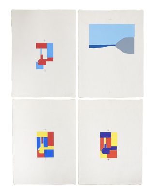 four different colored squares are arranged on a white surface
