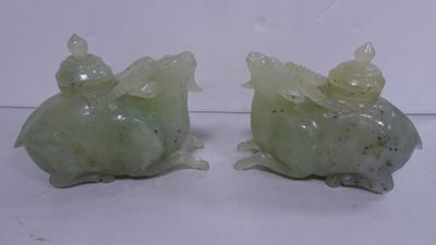 pair of green jade figurines of a fish and a turtle