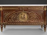 an ornately decorated chest with a marble top