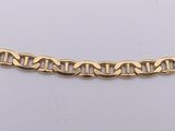 a yellow gold chain bracelet with a flat link on a white background