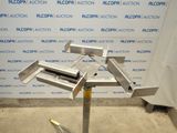 an image of a piece of metal on a stand