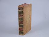 a small book that is sitting on a table