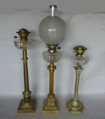 three lamps that are sitting next to each other on a table