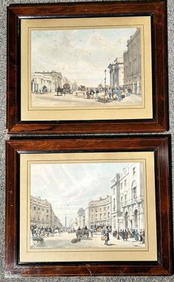 two framed pictures of a street scene with a horse drawn carriage and a horse drawn carriage
