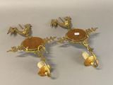 pair of antique brass candlesticks with dragon heads and bells