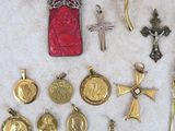 a lot of gold and silver items on a table