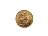 a close up of a gold coin on a white background