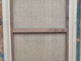a close up of a picture of a window frame with a burlock