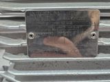 a metal plaque on the front of a motorcycle