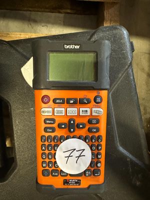 a calculator sitting on top of a black case