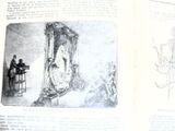 un livre ouvert sur lequel figure le dessin d'un homme et d'une femme assis sur une chaise