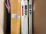 two remote controls in a box on the floor