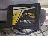 a black box with a yellow star on it sitting on a couch