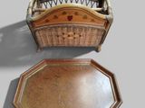 a wicker basket and a tray on a table