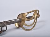 a metal key that is attached to a metal hook