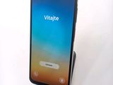 the back view of a smartphone with a display on the screen