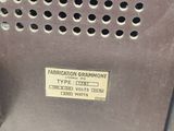 a close up of a metal box with a label on it