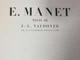 an open book with a black and white image of an e - manet