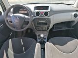 a picture of a car dashboard with a steering wheel