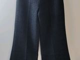 a picture of a pair of pants hanging on a hanger