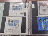 a binder that has a lot of stamps on it