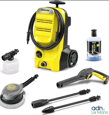 a yellow pressurer and other cleaning supplies on a white background