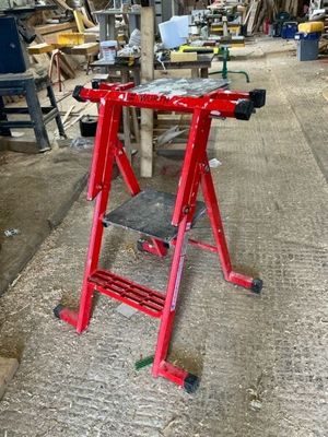 an image of a red work stand in a workshop