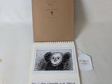 a picture of a book with a picture of a monkey on it
