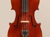 an old violin with a bow on a white background