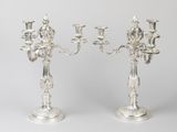 pair of silver plated candelabs with candlesticks on stands