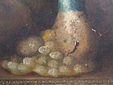 a painting of grapes and a blue vase on a table