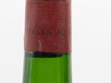a bottle of wine that is sitting on a table