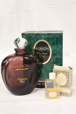 l'image d'un flacon de poison à côté d'une boîte de parfum