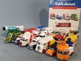 a lot of toy trucks that are sitting on the table