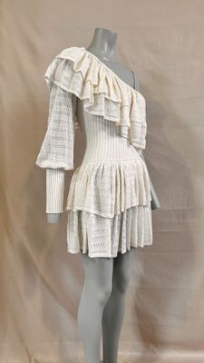 an image of a mannequin dressed in a white dress